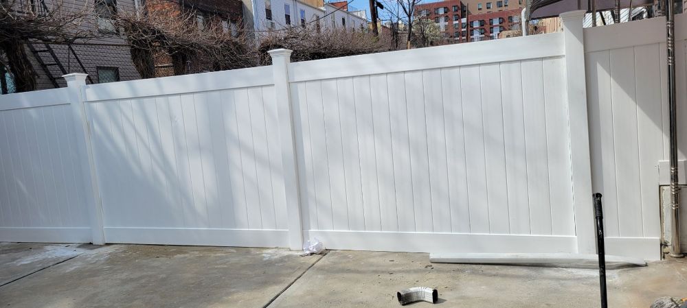 Newly installed vinyl privacy fence